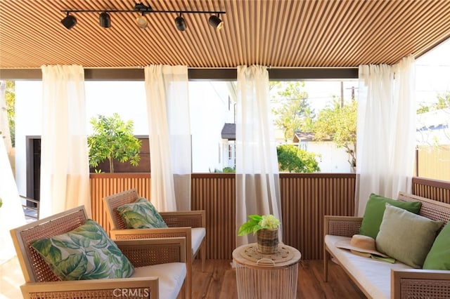 sunroom / solarium with plenty of natural light