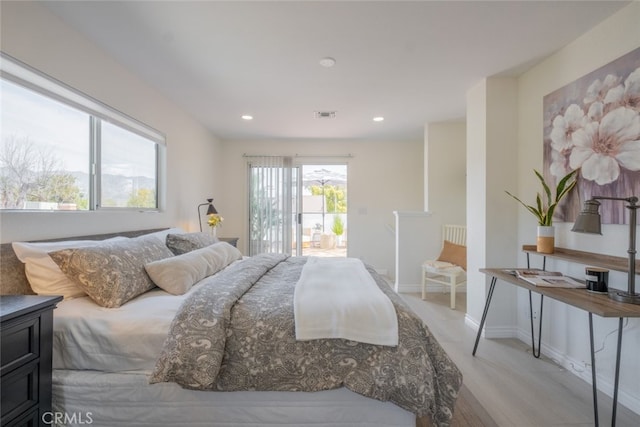 bedroom with access to exterior, recessed lighting, visible vents, and baseboards