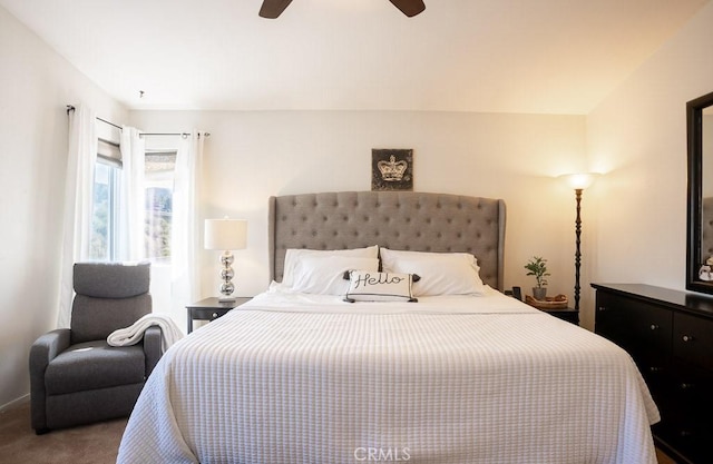 carpeted bedroom featuring a ceiling fan