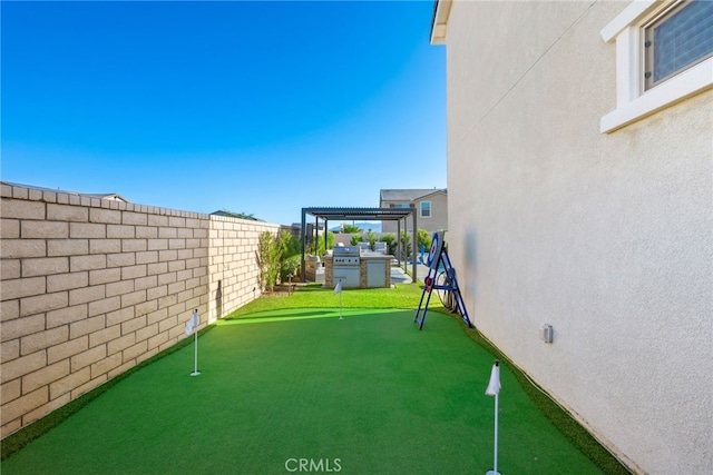 view of yard with a fenced backyard