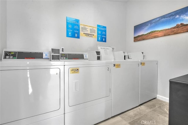 common laundry area with separate washer and dryer