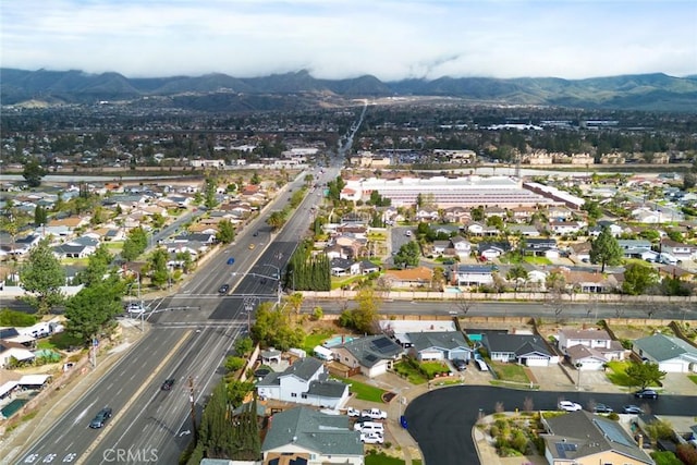 bird's eye view featuring a residential view and a mountain view