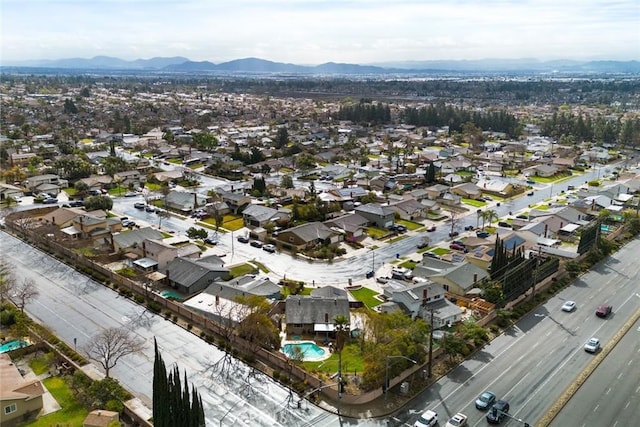 bird's eye view featuring a residential view and a mountain view