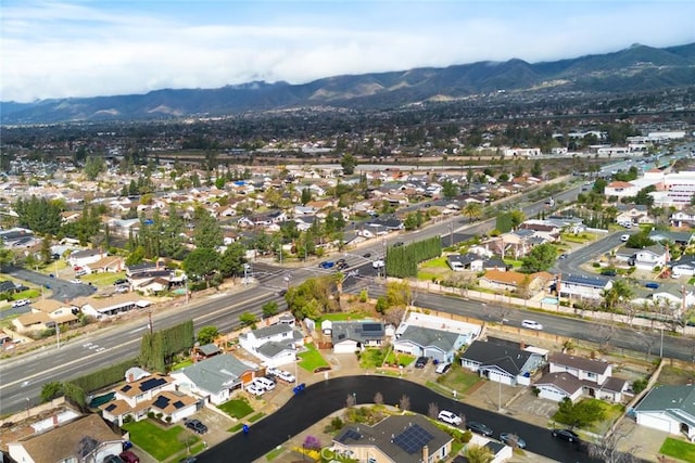 bird's eye view with a residential view and a mountain view