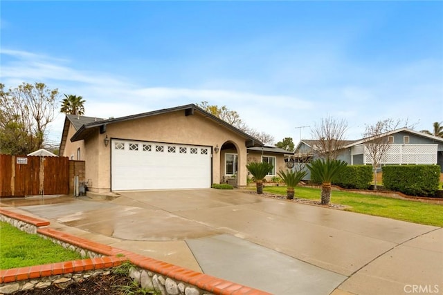 ranch-style house with concrete driveway, an attached garage, fence, and stucco siding