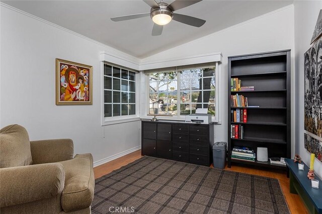 sitting room featuring lofted ceiling, dark wood-style floors, ceiling fan, and ornamental molding