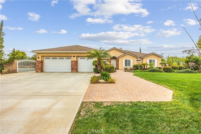 ranch-style home featuring a garage, concrete driveway, a gate, a front lawn, and stucco siding