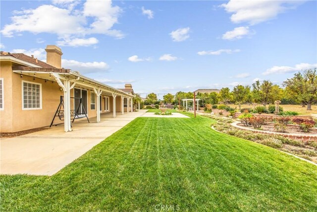 view of yard featuring a patio