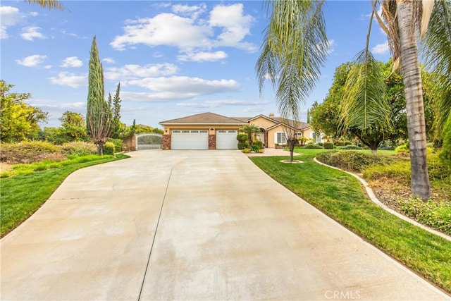 ranch-style home with concrete driveway and an attached garage