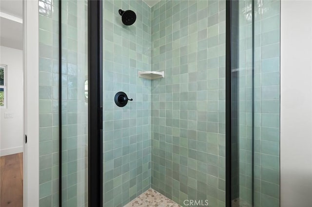 full bath featuring a stall shower