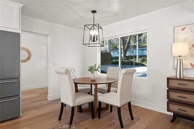 1985 Highland Oaks Dr, Arcadia, CA 91006 - dining room with a chandelier and light wood-style flooring
