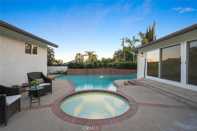 1985 Highland Oaks Dr, Arcadia, CA 91006 - pool at dusk featuring a patio area and a pool with connected hot tub