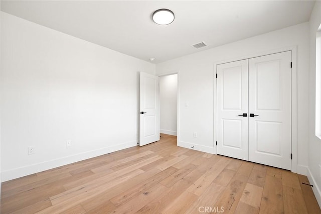 1985 Highland Oaks Dr, Arcadia, CA 91006 - unfurnished bedroom with light wood-style floors and a closet