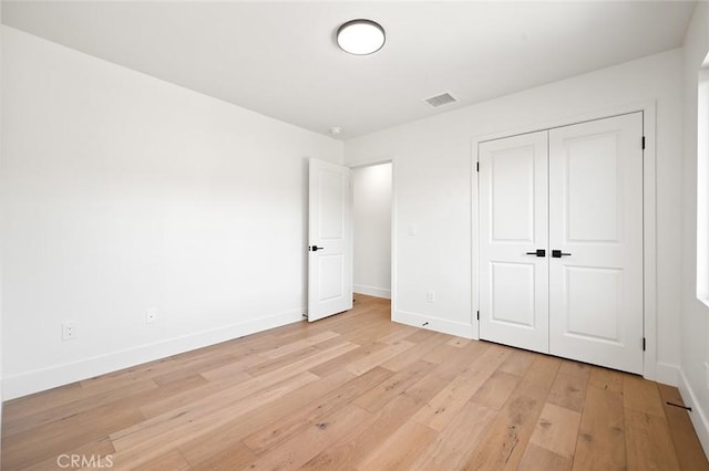 1985 Highland Oaks Dr, Arcadia, CA 91006 - unfurnished bedroom with light wood-type flooring and a closet