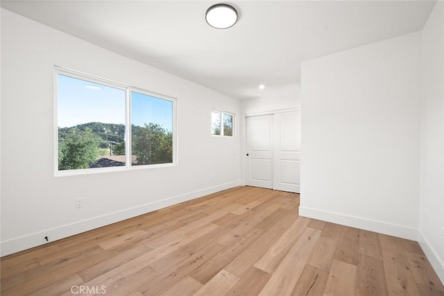 1985 Highland Oaks Dr, Arcadia, CA 91006 - empty room with light wood finished floors and recessed lighting