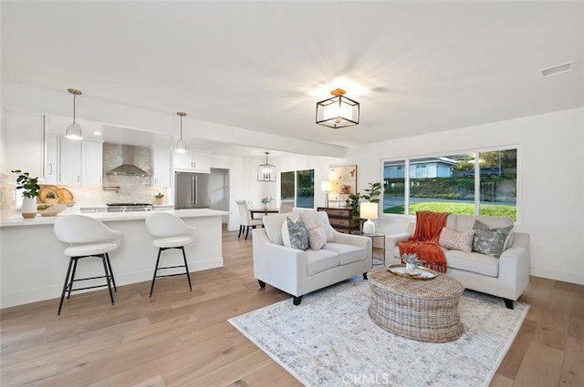 1985 Highland Oaks Dr, Arcadia, CA 91006 - living area featuring light wood-style flooring and baseboards