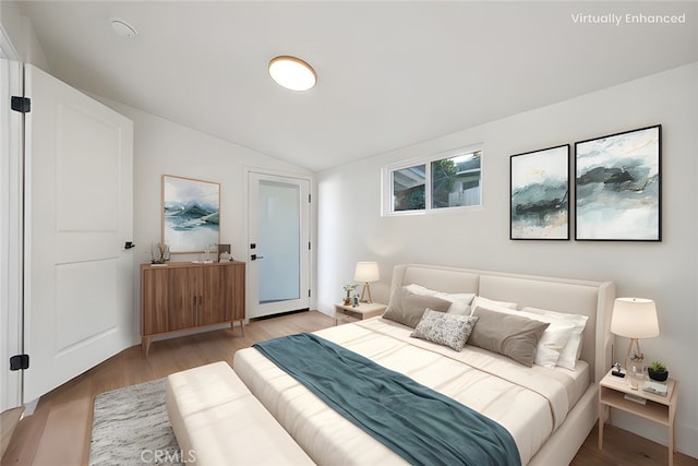 1985 Highland Oaks Dr, Arcadia, CA 91006 - bedroom with vaulted ceiling and light wood-style floors