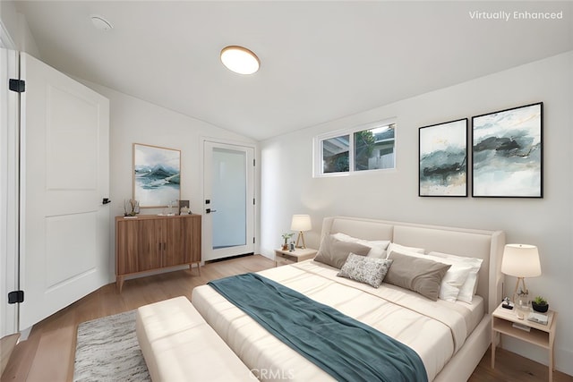 1985 Highland Oaks Dr, Arcadia, CA 91006 - bedroom featuring lofted ceiling and light wood-style floors