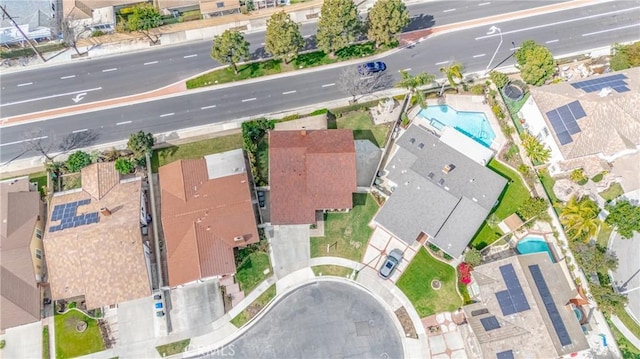 birds eye view of property with a residential view