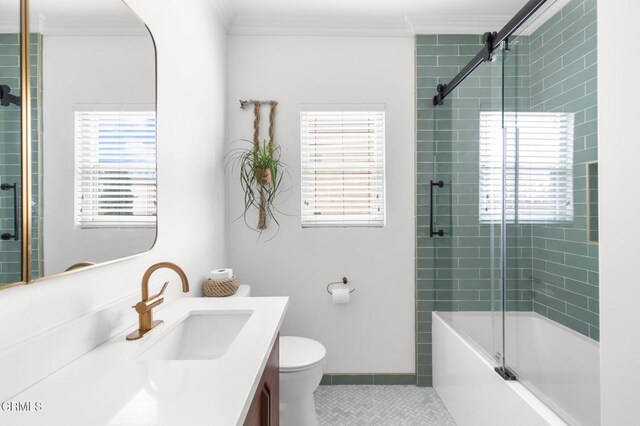 full bathroom featuring toilet, ornamental molding, vanity, baseboards, and tile patterned floors