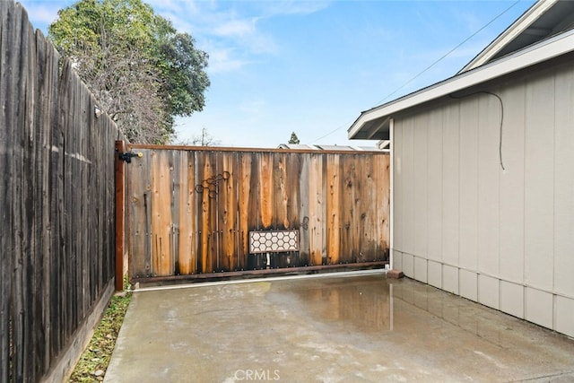 view of patio featuring fence