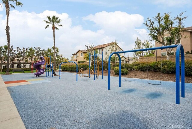 communal playground with a residential view