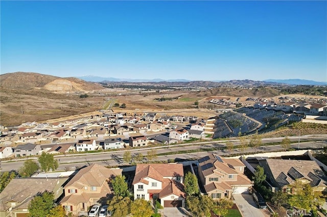 drone / aerial view featuring a mountain view and a residential view