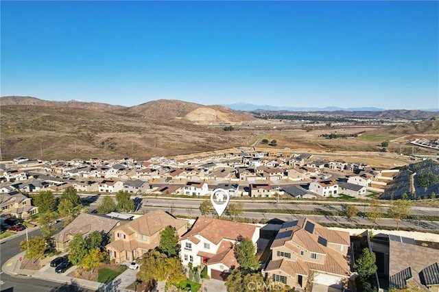 aerial view with a mountain view and a residential view