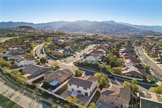 aerial view with a mountain view and a residential view