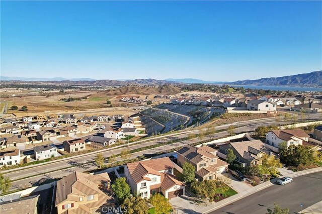 aerial view with a mountain view and a residential view