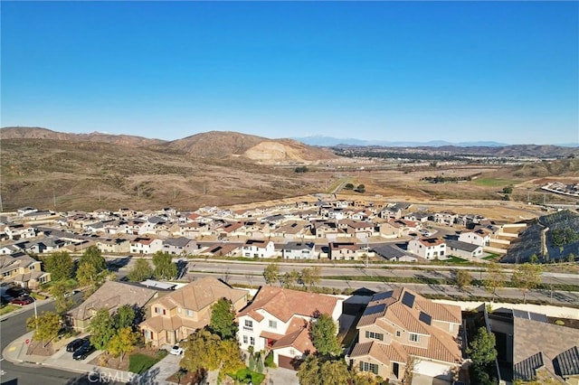 aerial view with a mountain view and a residential view