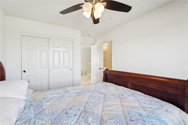 bedroom featuring a ceiling fan and a closet