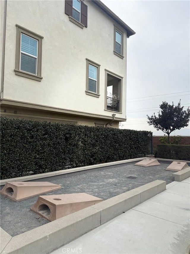 view of home's exterior with stucco siding