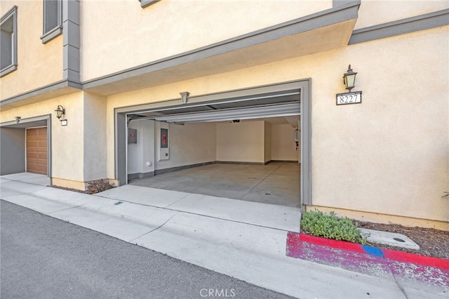garage featuring driveway