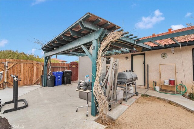 view of patio / terrace with fence