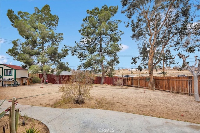 view of yard featuring a fenced backyard