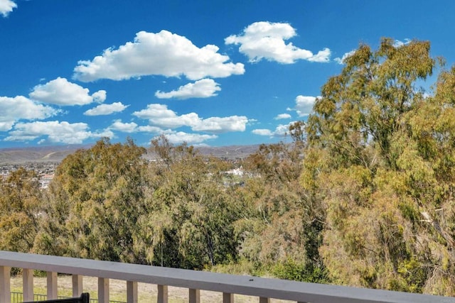 property view of mountains featuring a view of trees