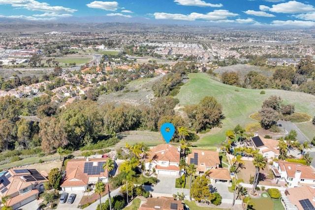 birds eye view of property with a residential view