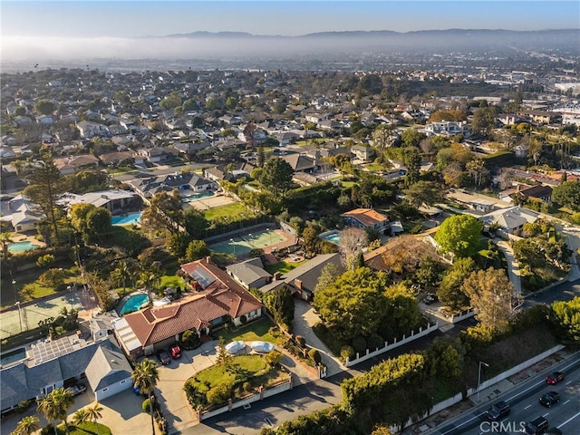 birds eye view of property with a residential view