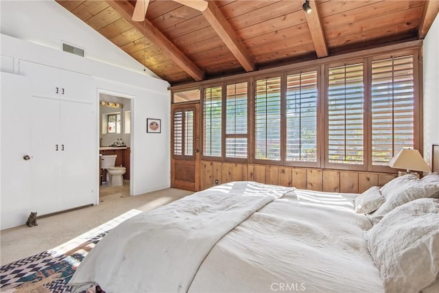 carpeted bedroom featuring lofted ceiling with beams, wooden ceiling, multiple windows, and visible vents