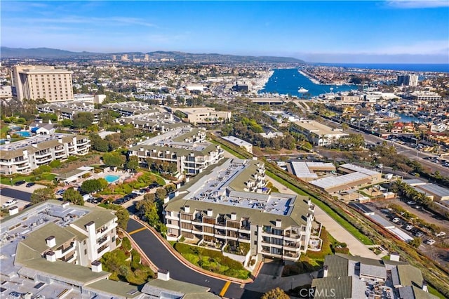 aerial view featuring a view of city and a water view