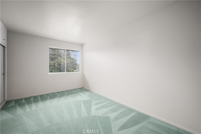 1860 Mckinney Way Unit 21L, Seal Beach, CA 90740 - empty room with light carpet
