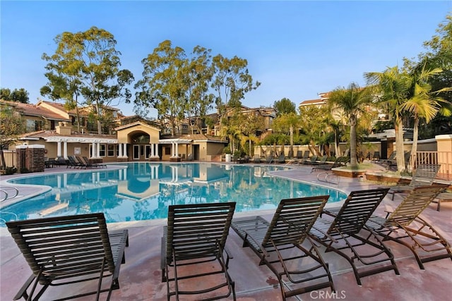 pool featuring a patio area