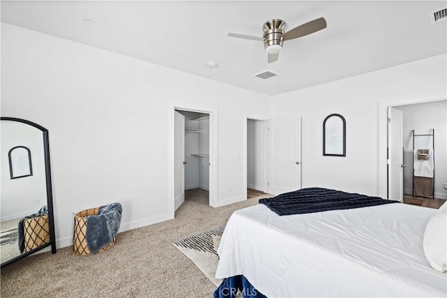 bedroom featuring ceiling fan, carpet, visible vents, and baseboards