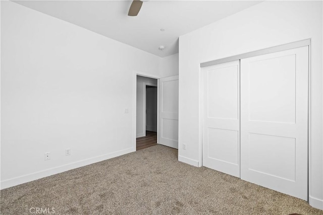 5651 W W Ave Unit J15, Lancaster, CA 93536 - unfurnished bedroom featuring carpet flooring, a closet, and a ceiling fan