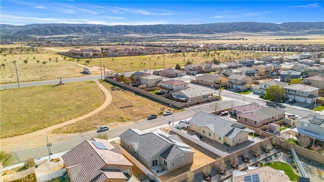 5651 W W Ave Unit J15, Lancaster, CA 93536 - aerial perspective of suburban area with a mountain backdrop