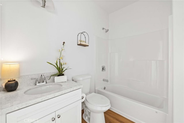 5651 W W Ave Unit J15, Lancaster, CA 93536 - full bath featuring shower / bathtub combination, vanity, and wood finished floors
