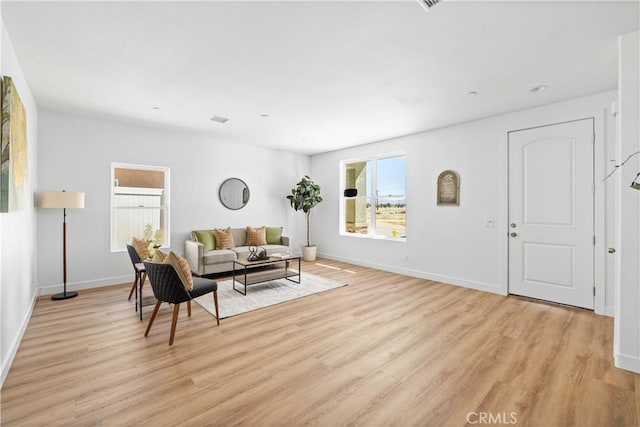 5651 W W Ave Unit J15, Lancaster, CA 93536 - living room featuring light wood-style flooring