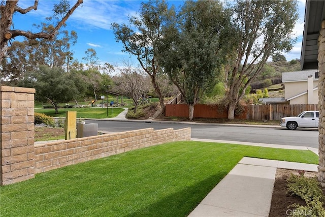 view of yard featuring fence