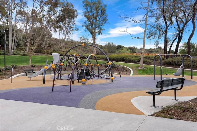 community playground with a lawn